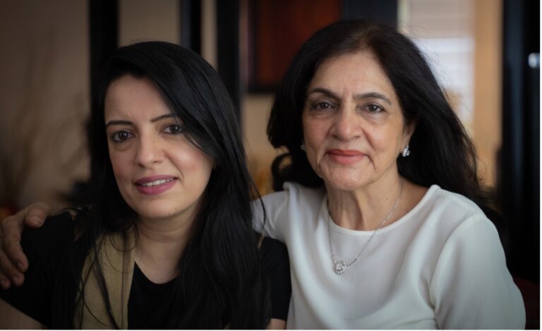 two women sitting together