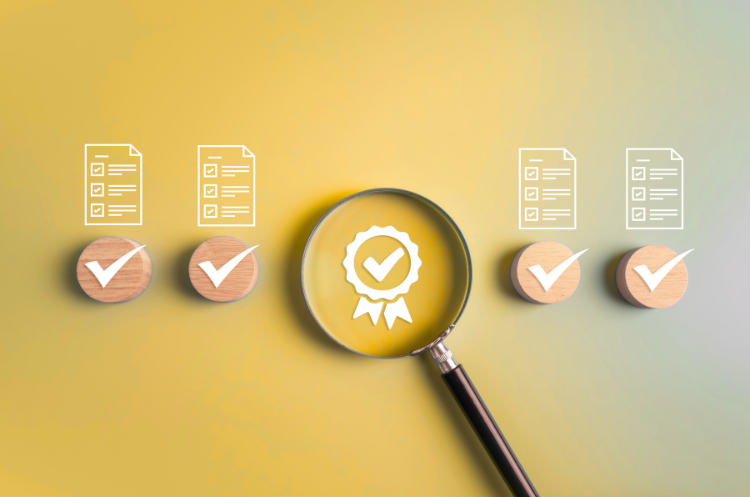 Magnifying glass highlighting a quality certification badge surrounded by checklist icons and approval checkmarks, symbolizing quality management, compliance, audits, standards, and process excellence in modern businesses.